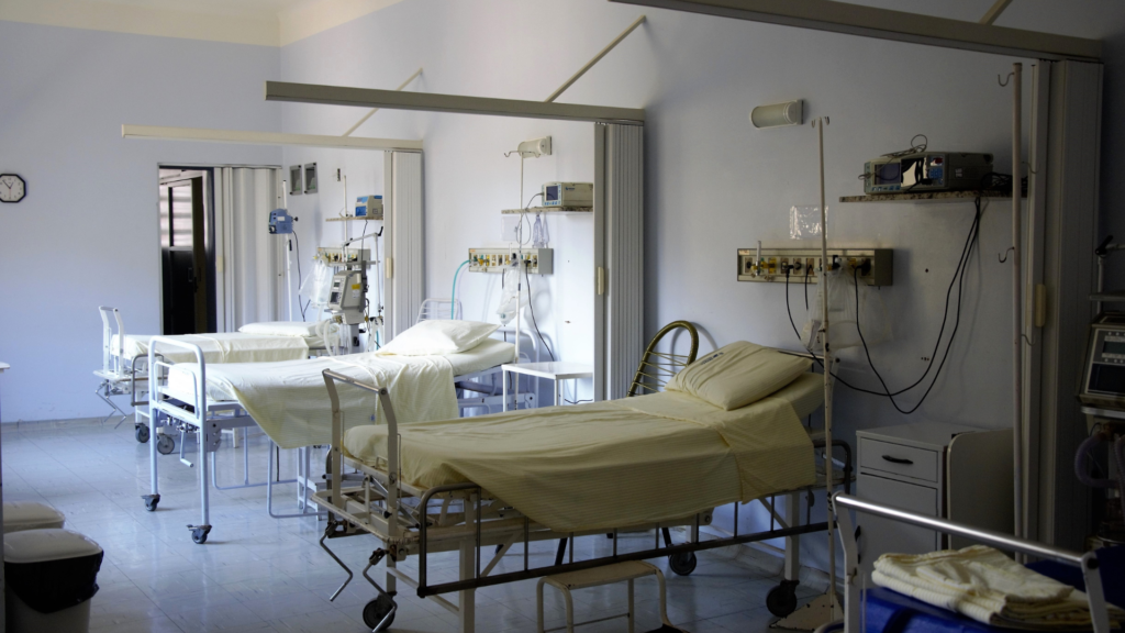 three hospital beds in an emergency room in a hospital